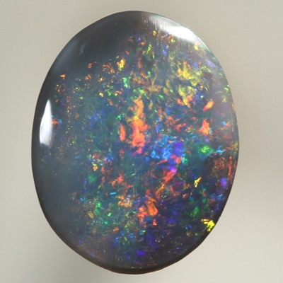 SOLID BLACK OPAL Bright, sparkling red fire dominates